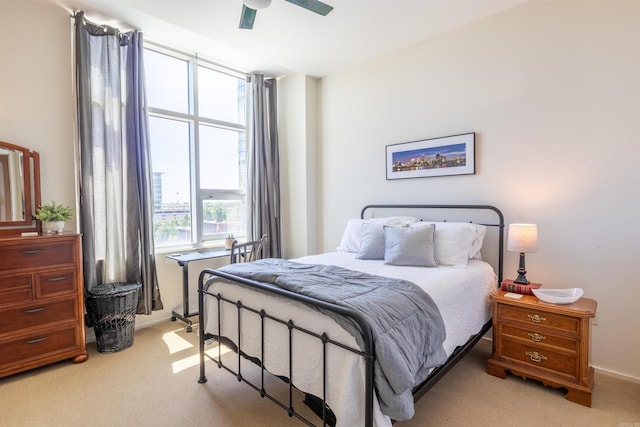 300 E 3rd St Unit 602, Little Rock, AR 72201 - bedroom with light colored carpet and ceiling fan