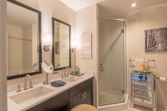 300 E 3rd St Unit 602, Little Rock, AR 72201 - bathroom featuring double vanity and a stall shower