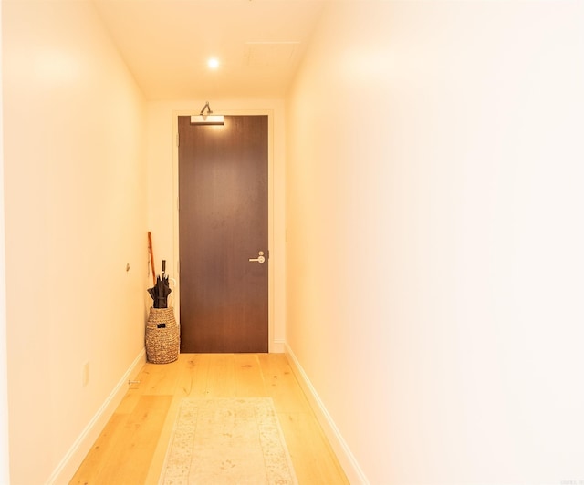300 E 3rd St Unit 602, Little Rock, AR 72201 - corridor featuring light wood finished floors and attic access