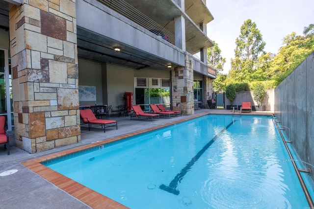 300 E 3rd St Unit 602, Little Rock, AR 72201 - view of swimming pool featuring a fenced backyard and a patio area