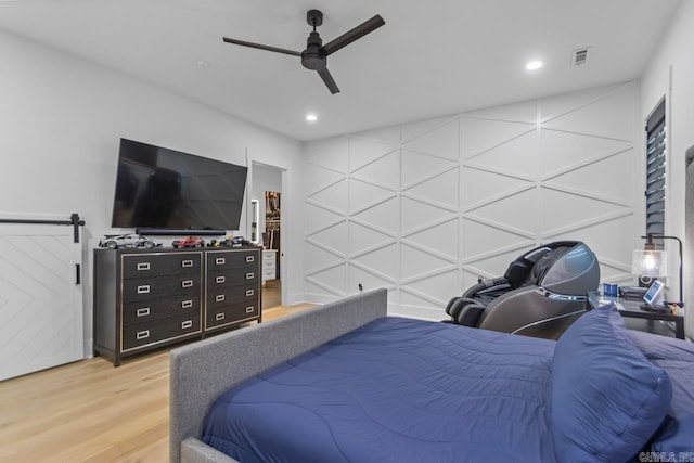 7509 S Shoreline, Benton, AR 72019 - bedroom with light wood finished floors, recessed lighting, and ceiling fan
