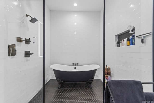 7509 S Shoreline, Benton, AR 72019 - bathroom featuring tile walls, a freestanding tub, tile patterned floors, a tile shower, and recessed lighting