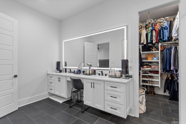 7509 S Shoreline, Benton, AR 72019 - full bathroom featuring vanity, tile patterned floors, and a spacious closet