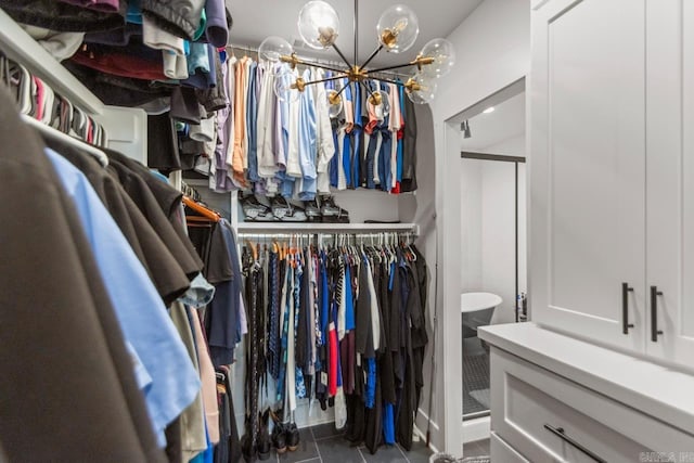 7509 S Shoreline, Benton, AR 72019 - walk in closet with a chandelier and tile patterned flooring