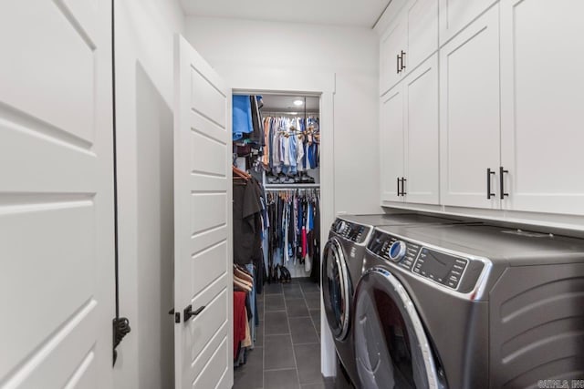 7509 S Shoreline, Benton, AR 72019 - washroom with cabinet space, washer and dryer, and dark tile patterned flooring