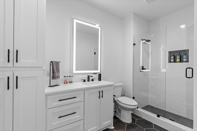 7509 S Shoreline, Benton, AR 72019 - bathroom with a shower stall, vanity, and tile patterned floors