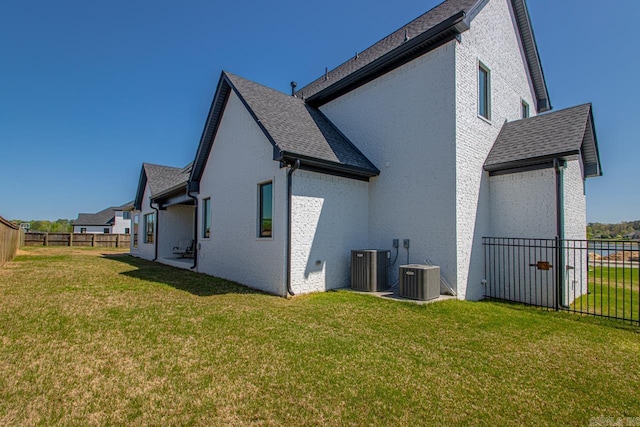 7509 S Shoreline, Benton, AR 72019 - rear view of house featuring a fenced backyard and a shingled roof