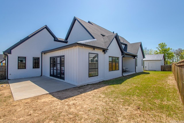 7509 S Shoreline, Benton, AR 72019 - back of property with a fenced backyard, a patio, a shed, and roof with shingles