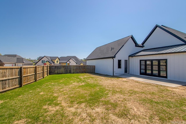 7509 S Shoreline, Benton, AR 72019 - fenced backyard featuring a patio area