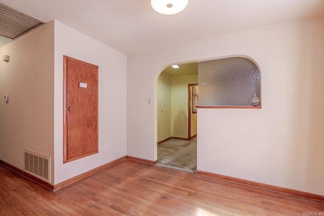 5302 A St, Little Rock, AR 72205 - unfurnished room with arched walkways and wood finished floors