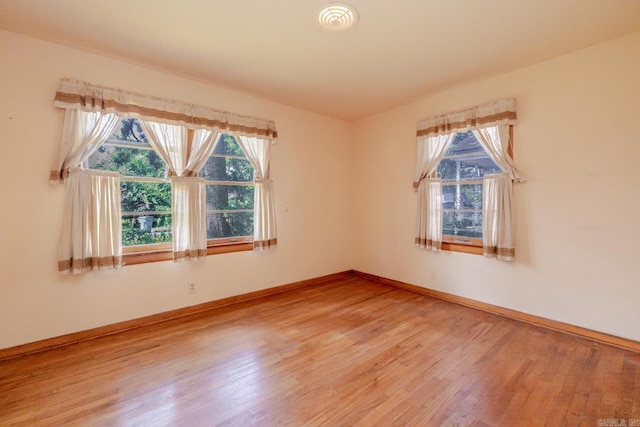 5302 A St, Little Rock, AR 72205 - spare room with wood finished floors and baseboards