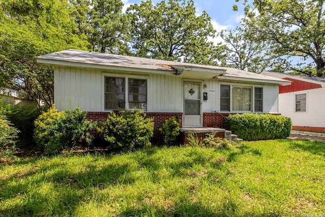 5302 A St, Little Rock, AR 72205 - bungalow-style home featuring brick siding and board and batten siding