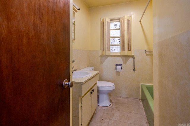 5302 A St, Little Rock, AR 72205 - full bathroom with vanity, a tub, and tile patterned floors