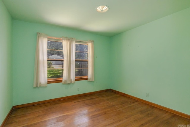 5302 A St, Little Rock, AR 72205 - empty room featuring wood finished floors and baseboards