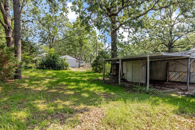 5302 A St, Little Rock, AR 72205 - view of green lawn featuring an outdoor structure