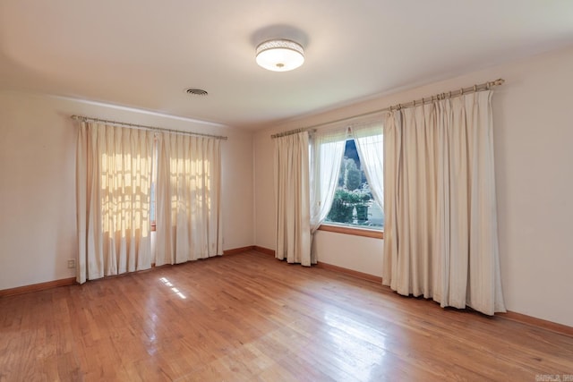 5302 A St, Little Rock, AR 72205 - unfurnished room featuring light wood-type flooring and baseboards
