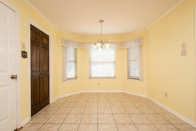 304 Dogwood Dr, Benton, AR 72019 - unfurnished dining area with a chandelier, ornamental molding, and light tile patterned flooring