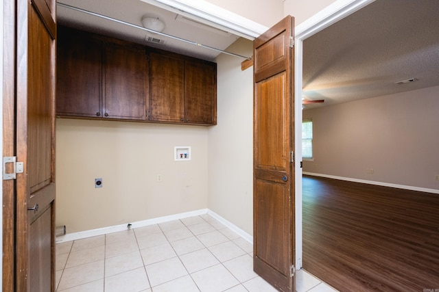 304 Dogwood Dr, Benton, AR 72019 - laundry area featuring cabinet space, washer hookup, electric dryer hookup, and a ceiling fan