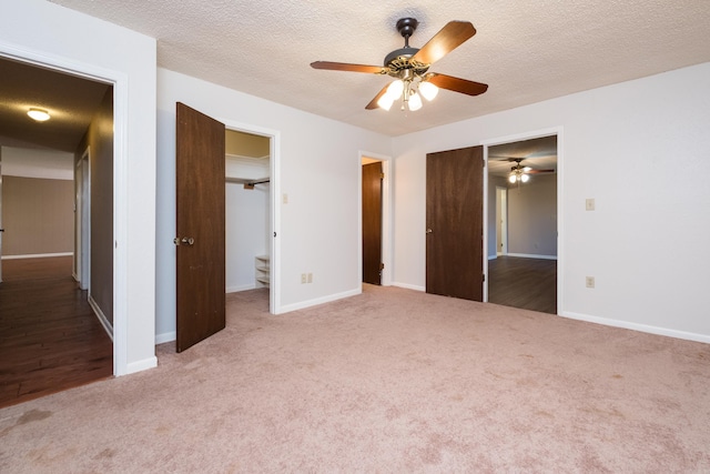 304 Dogwood Dr, Benton, AR 72019 - unfurnished bedroom featuring carpet, ceiling fan, a closet, and a textured ceiling