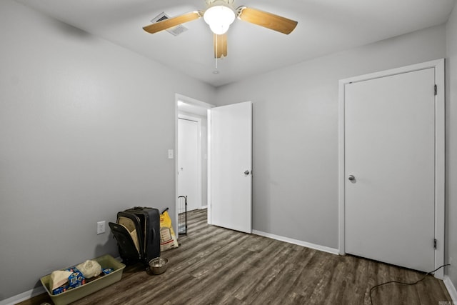 1324 Sunset Dr, Conway, AR 72034 - unfurnished bedroom featuring wood finished floors and ceiling fan