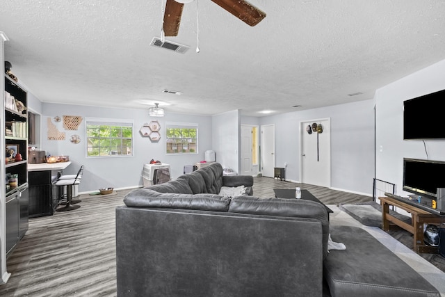 1324 Sunset Dr, Conway, AR 72034 - living room with a textured ceiling and ceiling fan