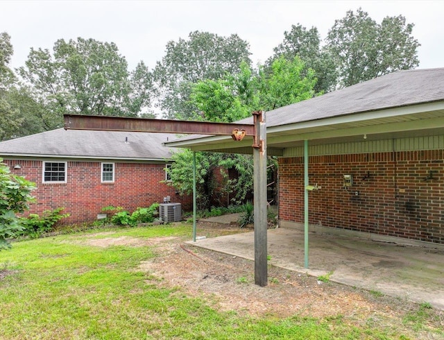 427 Morrison, Arkadelphia, AR 71923 - rear view of house featuring brick siding and a patio area