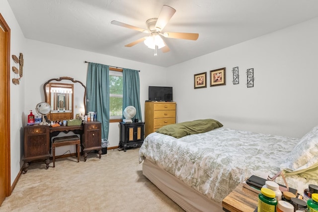424 Center Rdg, Drasco, AR 72543 - bedroom featuring light carpet and ceiling fan
