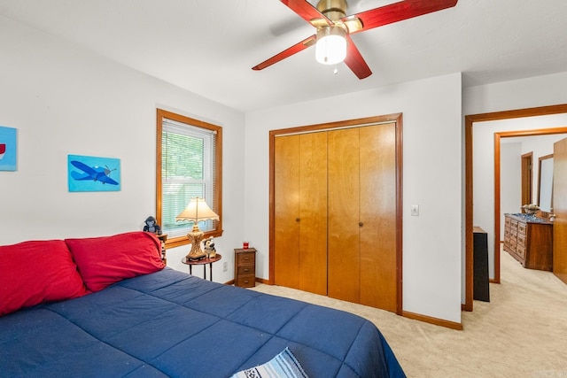 424 Center Rdg, Drasco, AR 72543 - bedroom with light colored carpet, a closet, and ceiling fan