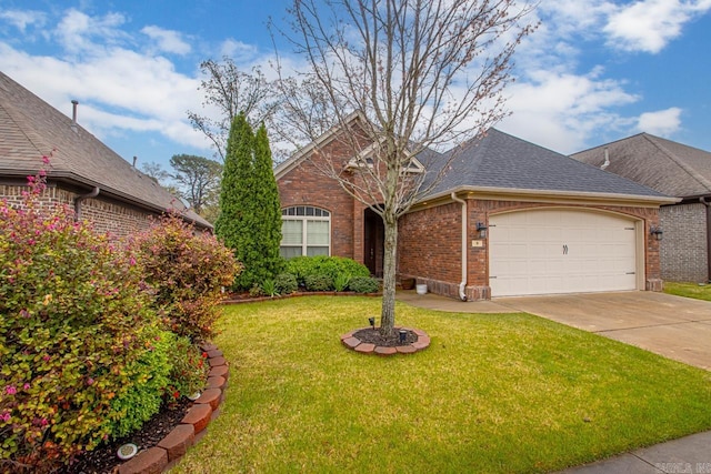 9 Bishop Pl, Little Rock, AR 72223 - view of front of house with brick siding, an attached garage, concrete driveway, a front lawn, and a shingled roof