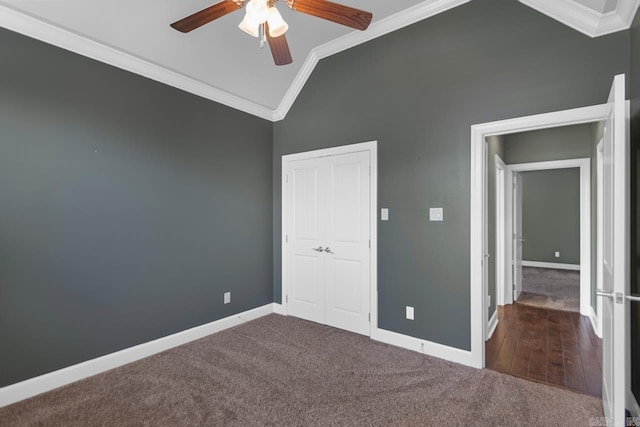 9 Bishop Pl, Little Rock, AR 72223 - unfurnished bedroom featuring crown molding, vaulted ceiling, carpet flooring, a ceiling fan, and a closet