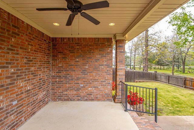 9 Bishop Pl, Little Rock, AR 72223 - fenced backyard with a ceiling fan and a patio area