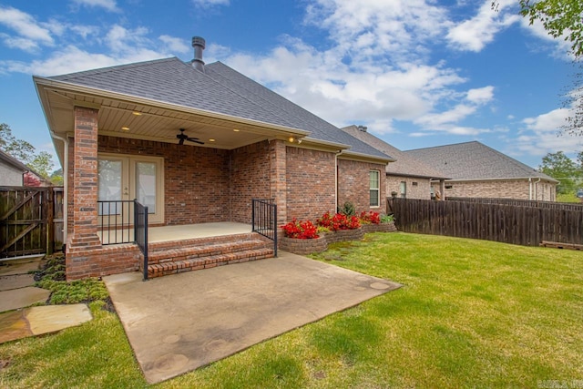 9 Bishop Pl, Little Rock, AR 72223 - rear view of house featuring ceiling fan, a fenced backyard, roof with shingles, a patio, and brick siding