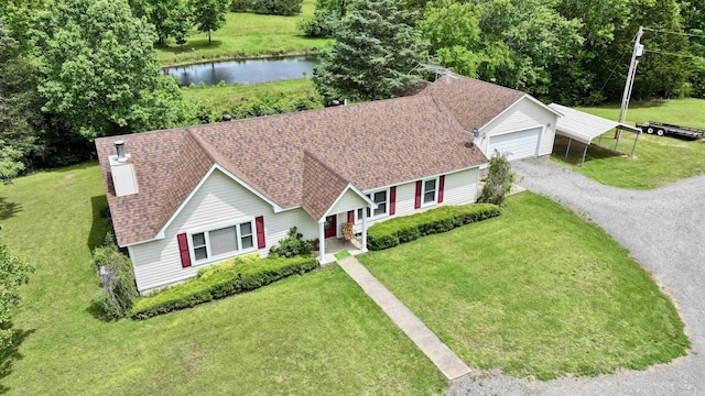 1005 Georgia Ridge Rd, Searcy, AR 72143 - view of front of home with a front lawn, a garage, a shingled roof, and a water view