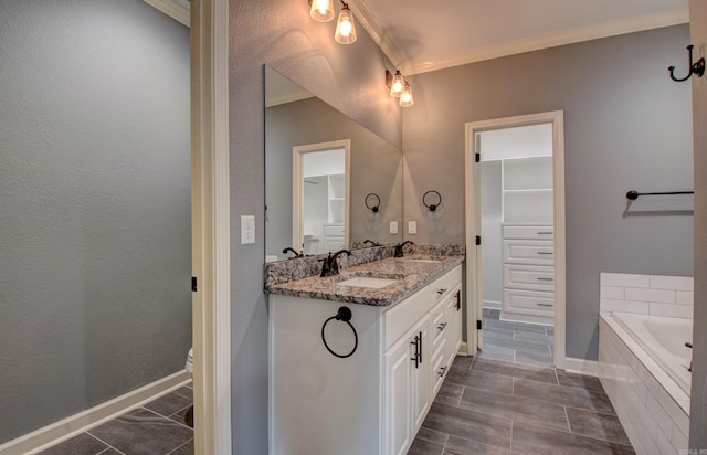 513 Sweet Gum Ct, Cabot, AR 72023 - bathroom with crown molding, double vanity, a bath, and tile patterned flooring