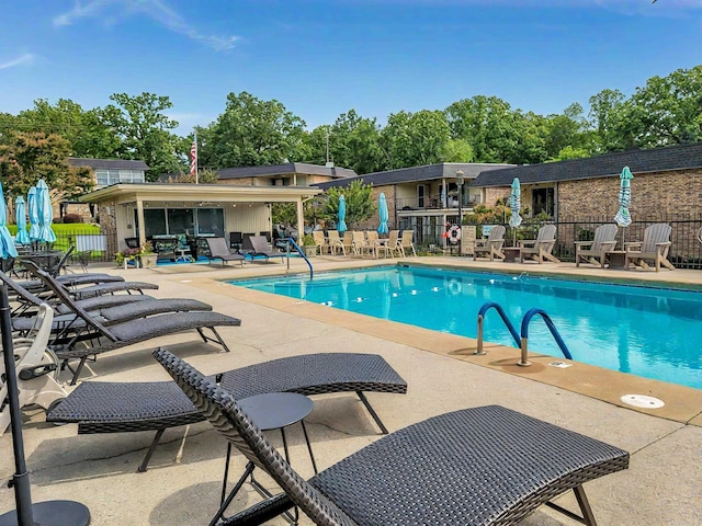 1127 Twin Points Rd Unit A, Hot Springs, AR 71913 - community pool featuring a patio and view of wooded area
