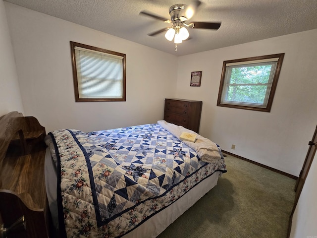 1206 Broadway Ave, Bull Shoals, AR 72619 - carpeted bedroom featuring a textured ceiling and ceiling fan