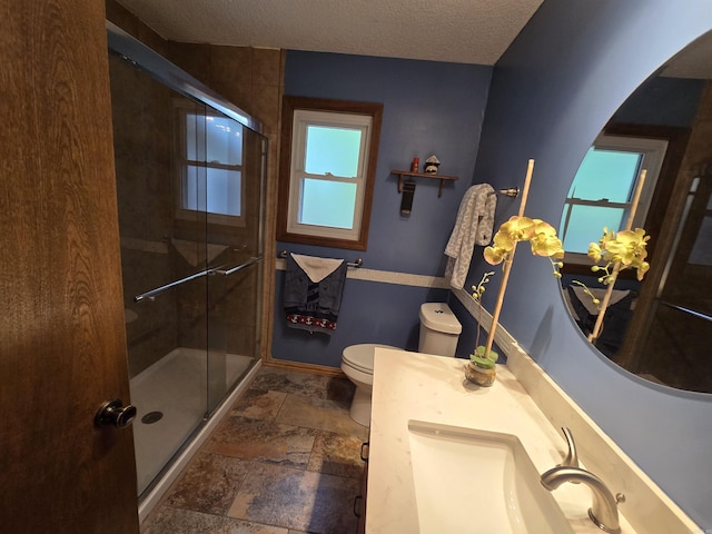 1206 Broadway Ave, Bull Shoals, AR 72619 - full bath with a stall shower, stone finish flooring, vanity, and a textured ceiling