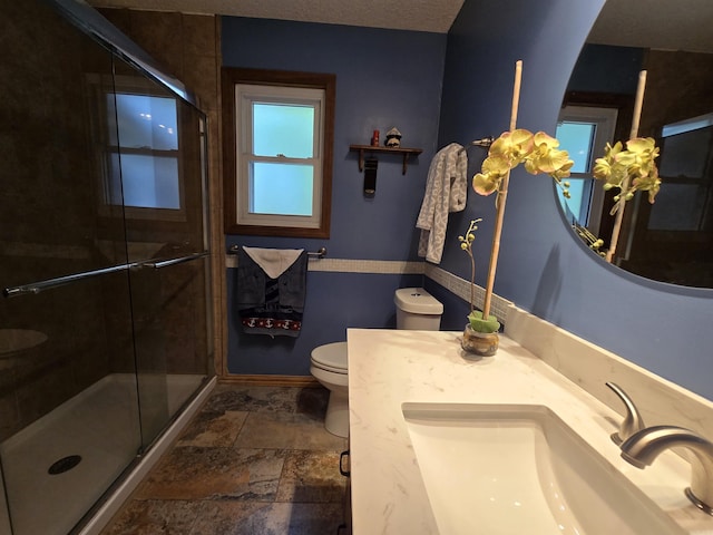 1206 Broadway Ave, Bull Shoals, AR 72619 - bathroom with a shower stall, vanity, and stone finish flooring