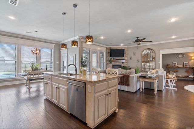 2705 Pulaski Dr, Conway, AR 72034 - kitchen with stainless steel dishwasher, open floor plan, a ceiling fan, crown molding, and a fireplace