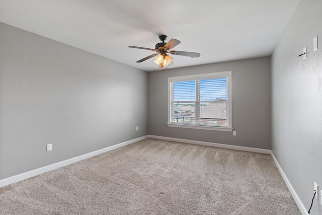 2705 Pulaski Dr, Conway, AR 72034 - carpeted spare room with a ceiling fan and baseboards