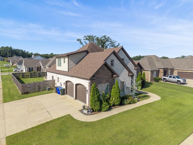 2705 Pulaski Dr, Conway, AR 72034 - view of home's exterior featuring driveway, a garage, roof with shingles, and brick siding