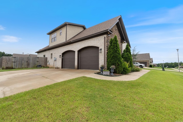 2705 Pulaski Dr, Conway, AR 72034 - view of property exterior with brick siding, driveway, an attached garage, and a shingled roof