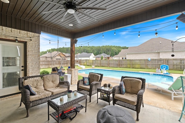 2705 Pulaski Dr, Conway, AR 72034 - view of swimming pool featuring a fenced backyard, ceiling fan, and a patio