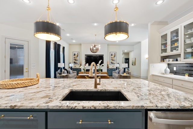 2960 Orchard View Dr, Conway, AR 72034 - kitchen featuring dishwasher, open floor plan, light stone countertops, and recessed lighting