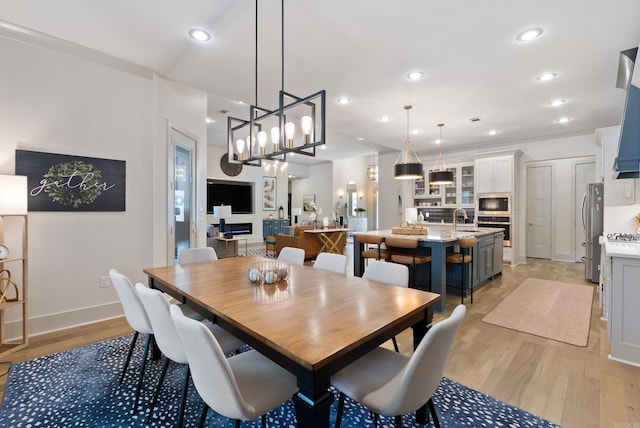 2960 Orchard View Dr, Conway, AR 72034 - dining area with light wood-style floors, recessed lighting, and a chandelier