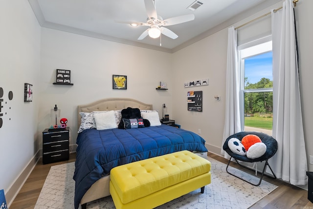 2960 Orchard View Dr, Conway, AR 72034 - bedroom with wood finished floors and a ceiling fan