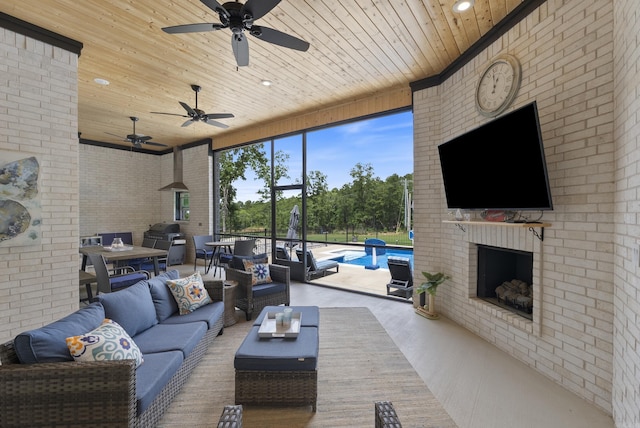2960 Orchard View Dr, Conway, AR 72034 - living room with wooden ceiling, a ceiling fan, brick wall, recessed lighting, and an outdoor brick fireplace