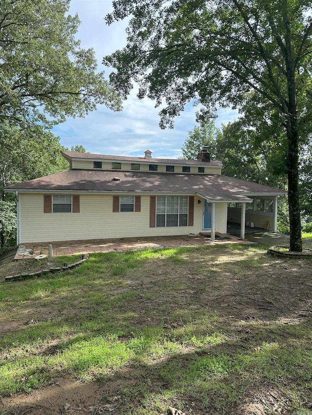 900 Davidson Cir, Edgemont, AR 72044 - back of house featuring a chimney