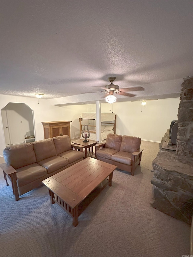900 Davidson Cir, Edgemont, AR 72044 - living room featuring carpet floors, a textured ceiling, and a ceiling fan