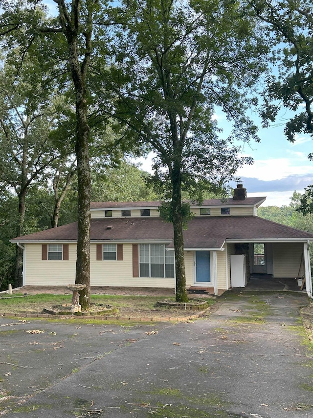 900 Davidson Cir, Edgemont, AR 72044 - single story home featuring driveway, an attached carport, and a chimney